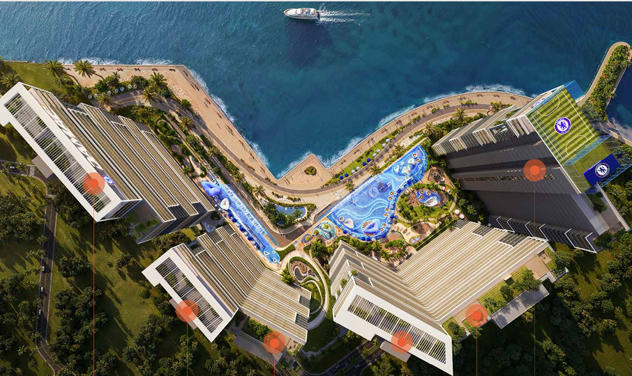 Vue aérienne du podium, des piscines et de la plage privée de Chelsea Residences